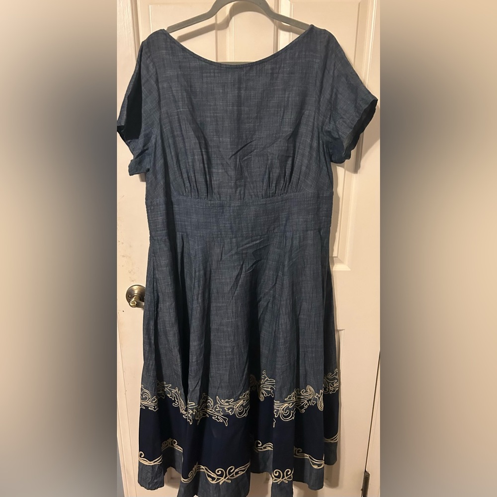 Gorgeous denim dress with embroidered bottom